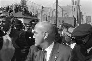 Police escorting Jacqueline Kennedy (hidden from view) down Auburn Avenue to Ebenezer Baptist Church for Martin Luther King, Jr.'s funeral.