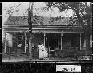 Photograph of the Passolt House with Passolt children and their nurse standing in front, Newnan, Coweta County, Georgia, 1909