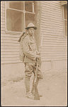 [Unidentified African American soldier in uniform, cartridge belt, and campaign hat with bayoneted rifle and knapsack]