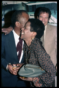 James Baldwin hugging Esther Terry at his 60th birthday celebration, UMass Campus Center