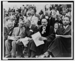 [Seated on speakers' platform at May 17 Prayer Pilgrimage for Freedom in Washington, D.C. (left to right): Roy Wilkins, A. Philip Randolph, Rev. Thomas Kilgore, Jr., and Martin Luther King, Jr.]