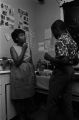 Gloria Bradford and Franklin Howard in the darkroom used by Southern Courier staff in Montgomery, Alabama.