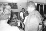 Members of Bobby Moore and the Rhythm Aces seated on the group's bus after a performance by at a dance at the National Guard Armory on Dallas Avenue in Selma, Alabama.