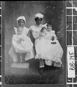 Photograph of the Lamon cousins with their nurses, Macon, Bibb County, Georgia, ca. 1903