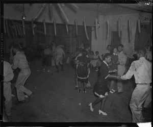 Group of men in military uniform dancing with women : cellulose acetate photonegative