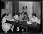 Newport News, Virginia. Mrs. Ethel R. Stephens, organizer of the Consumer Interest Council, a group of Negro housewives at Newport News, making a report to the members of the Special Services Section of the Office of Price Administration, concerning point rationing. Left to right: Mrs. M. Barr, Miss A. Wilson, Miss Freedman, Mrs. Ethel Stephens, Miss Warrick and Miss F. Williams