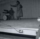 Dancer and musician performing at George Washington Carver School