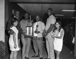 Men and women with trophies, 1968