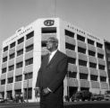 A. G. Gaston in front of the new Citizens Federal Savings Bank building at the corner of 3rd Avenue and 18th Street in downtown Birmingham, Alabama.