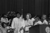 Rosalynn Carter receiving a framed certificate at the annual meeting of the Women's Auxiliary of the National Baptist Convention U.S.A. in Birmingham, Alabama.