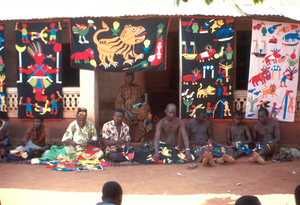 Appliqué workers, in street, Abomey, Benin