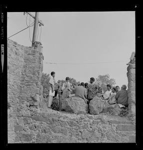 Some 700 Roxbury High and Junior High School students gather at the Elma Lewis Playhouse in Franklin Park and listen to Black artist Dana Chandler demand more rights and representation for their race in the Boston School system