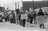 United Klans of America march through downtown Gadsden, Alabama.