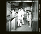 Bathhouse checkout area, circa 1953