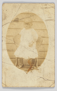 Photographic postcard of unidentified child