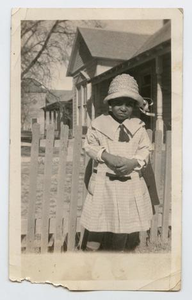 Photograph of an African-American Girl in a White Dress and Hat