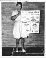 Girl With Food Group Sign