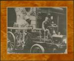 New York City fire fighter Wesley A. Williams in the driver's seat of a fire truck at Engine Company No. 55, in Manhattan's Lower East Side