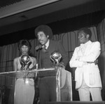 Group Standing on Stage, Los Angeles, 1978