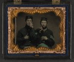 [Two unidentified soldiers in Union uniforms holding cigars in each others' mouths]