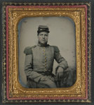 [Private Joseph T. Rowland of Co. A, 41st Virginia Infantry Regiment in uniform with epaulets and kepi with pistol in belt]