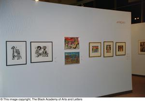 Photograph of an African gallery wall, featuring seven art works