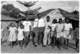 YMCA man [Dan Tyler] in Liberia goes to small village to help organize recreation program for village youngsters.