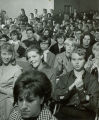 Students applaud at debate