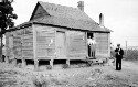 Charlottesville area. Unidentified house and people