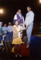 Youths Holding Trophy