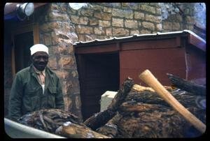 Oliver Jacobs behind a Truck Laden with Wood