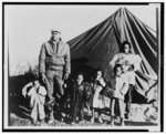 [Sharecroppers Early B. Williams, his wife Mary Williams and children in front of their tent, Tent City, Somerville, Fayette County, Tennessee]