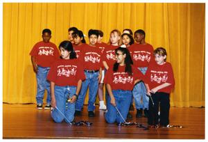 Choir Children on Stage with Party Streamers