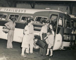 Young woman getting off a bus in Montgomery, Alabama.