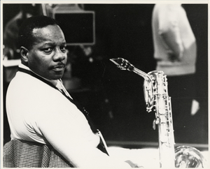 Harry Larney with saxophone : black-and-white photoprint.