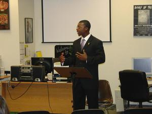 Man in a suit presenting during 2006 BHM