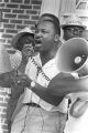 Thumbnail for Martin Luther King, Jr., addressing an audience in front of the Neshoba County Library in Philadelphia, Mississippi, during the "March Against Fear" begun by James Meredith.