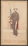 [Unidentified Union sailor in uniform with American flag]