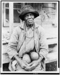 Uncle gets some citrus fruit to pep up his appetite, Cleveland, Miss.