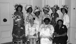 African American women posing in flowered straw hats, Los Angeles, 1989