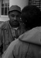 Scott B. Smith of SNCC speaking with John Davis of SCLC, in front of the Barbour County courthouse in Eufaula, Alabama.