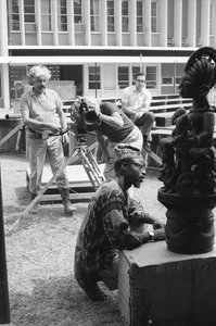 Eliot Elisofon and cameraman George Bracher filming renowned woodcarver Lamidi Olonade Fakeye, Ibadan, Nigeria