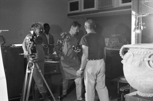 Eliot Elisofon and cameraman George Bracher filming pot found at Igbo-Ukwu excavation site, Ibadan, Nigeria