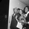 Redd Foxx with young women, probably in Birmingham, Alabama.