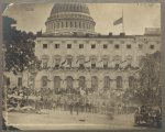 [Washington, D.C. Spectators at side of the Capitol, which is hung with crepe and has flag at half-mast during the "grand review" of the Union Army]