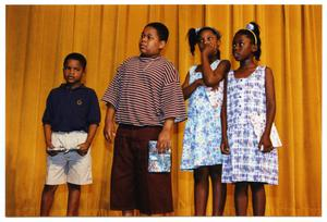 Children on Stage with Gifts