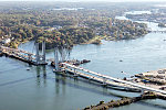 An October 2017 aerial view of the historic seaport of Portsmouth, New Hampshire, the largest city along the shortest coastline (18 miles) of any U.S. state. The focus is on the new Sarah Mildred Long Bridge, a span set to open approximately one month after the date of this photograph