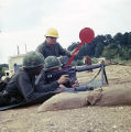 Soldier shooting an M16 rifle at the U.S. Army training facility at Fort McClellan near Anniston, Alabama.