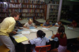 Students working in school library