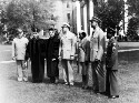 Commencement, Virginia State College. Left to right: Brigadier General George A. Horkan, President L.H. Foster, Dr. Jackson Davis, Captian Melvin T. Jackson, Lt. Minnie Patterson, 2nd Lt. Robert Weaver, and Sgt. David Goodwyn